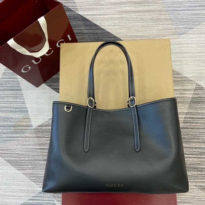 G*u*i shopping bags
